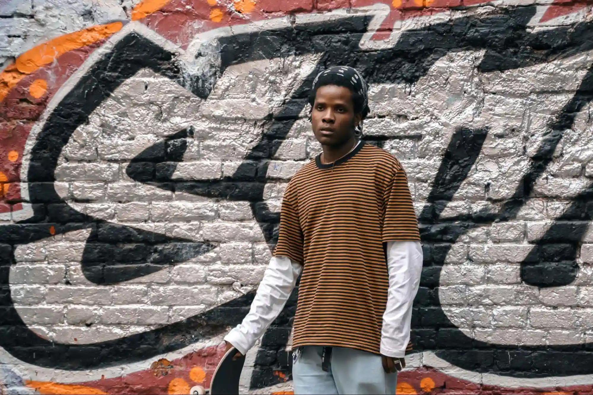 How do you build a cohesive streetwear outfit starting with one base piece?